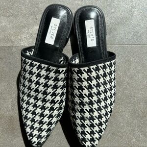 Black and White Women's Mules size 8.5.